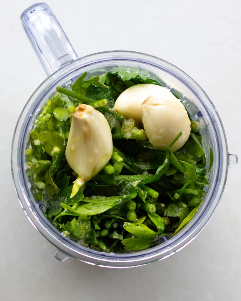 Parsley, garlic, seasonings and lemon juice in blender