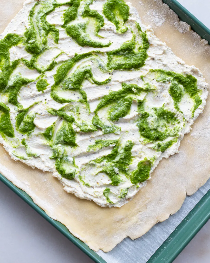 Parsley sauce added to ricotta and puff pastry