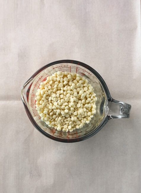 white chocolate chips in a measuring cup