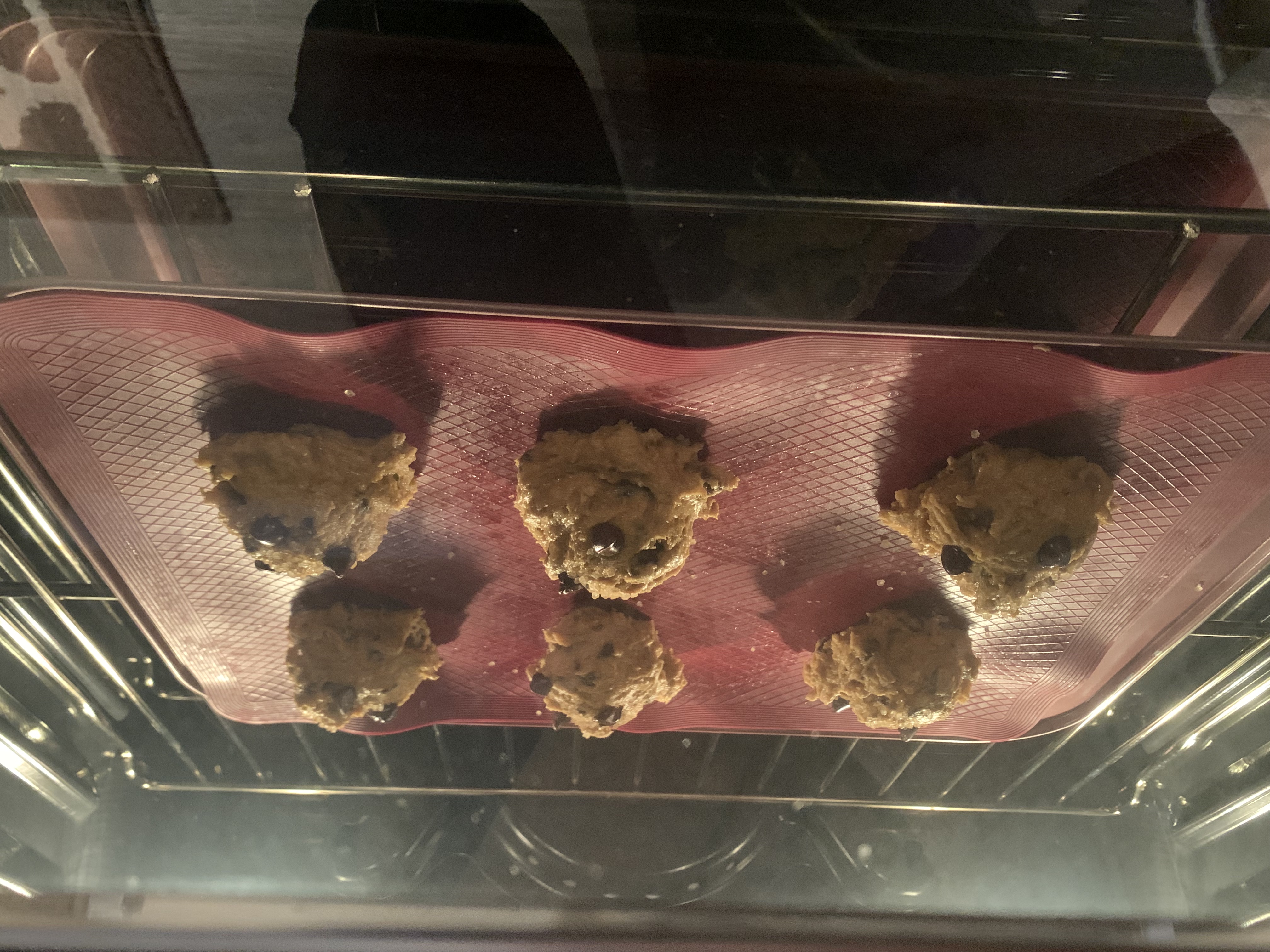 pumpkin chocolate chip cookies in the oven