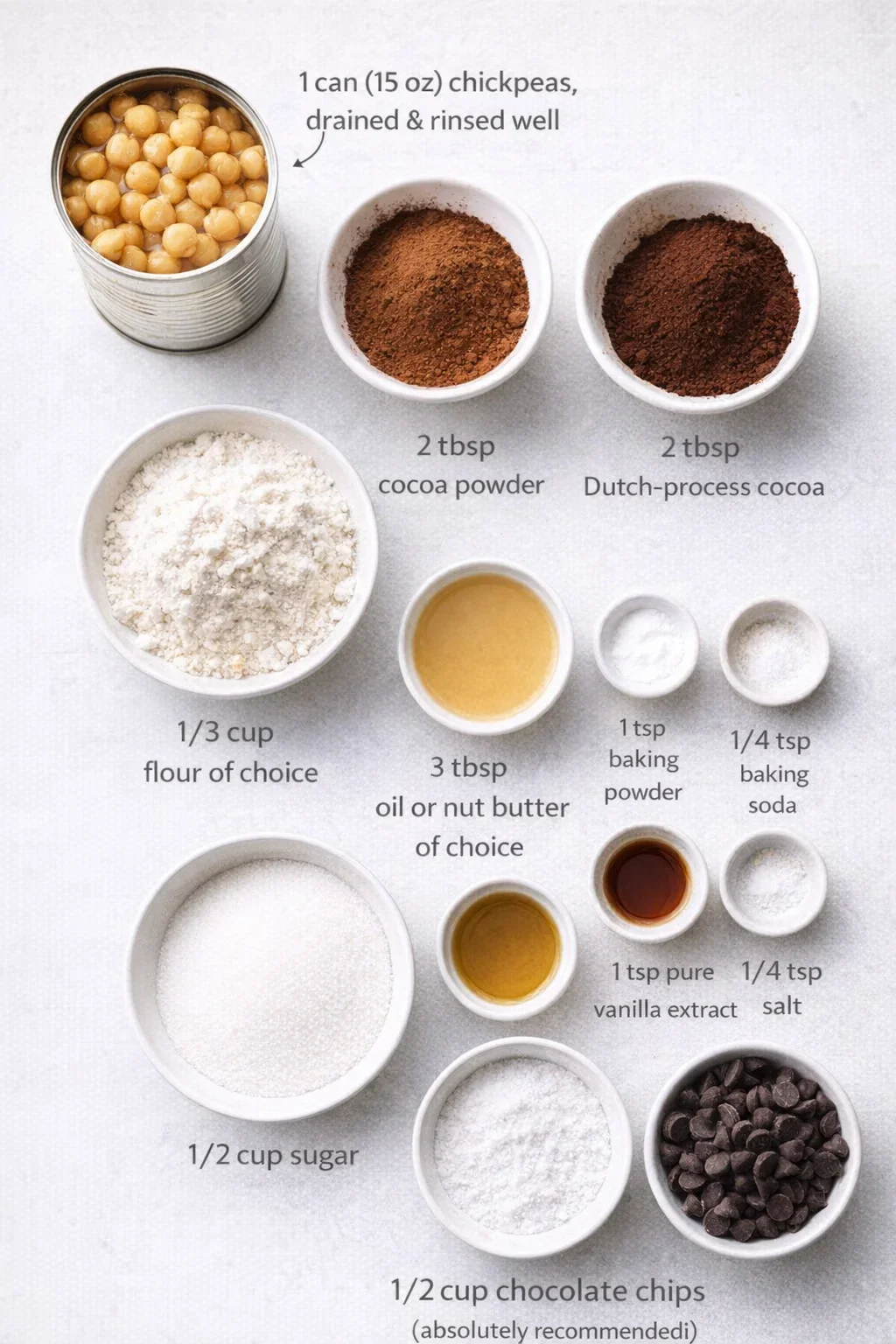 Ingredients for moist, fudgy chocolate chickpea brownies including chickpeas, cocoa, and chocolate chips.