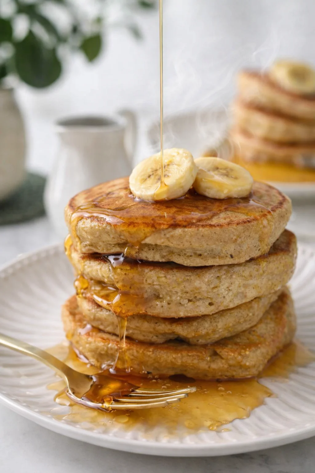 Final plated Quinoa Pancakes served as a hero shot
