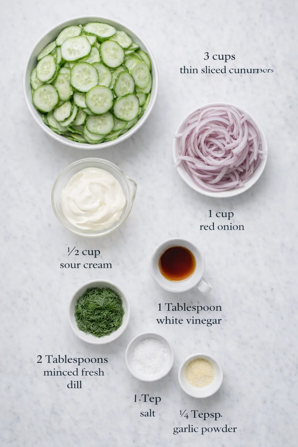 Measured ingredients arranged for Creamy Cucumber Salad Recipe | Refreshing Summer Side: 3 cups thinly sliced cucumbers, 1 cup thinly sliced red onion, 1/2 cup sour cream, 1 Tablespoon white vinegar, 2 Tablespoons minced